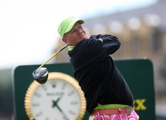 American John Daly drives the ball on the 3rd tee on the second day of the Open championship in St.Andrews, Scotland on July 16, 2010.  LON2010071611 o0 USA