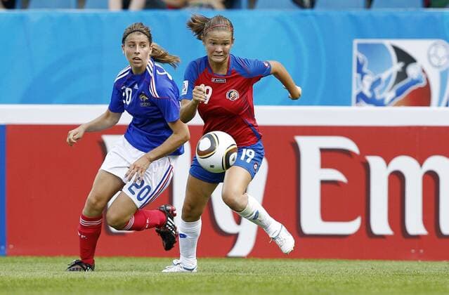 Fabiola Sanchez (Costa Rica, R) and Camille Catala (France, L) during the FIFA U20 Women s World Cup Group A match between Costa Rica (red) and France (blue) at the FIFA U-20 Women s World Cup stadium on July 16, 2010 in Bochum.
