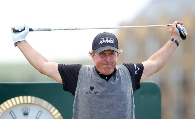 Phil Mickelson (USA) stretches on the 2nd tee on the third day of the Open championship in St.Andrews, Scotland on July 17, 2010.  LON2010071701