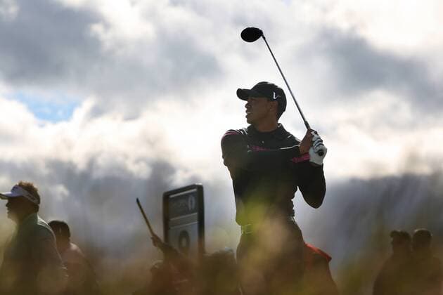 Tiger Woods of USA plays off the 9th tee during the third day of the Open Golf Championships at St Andrews, Scotland. 