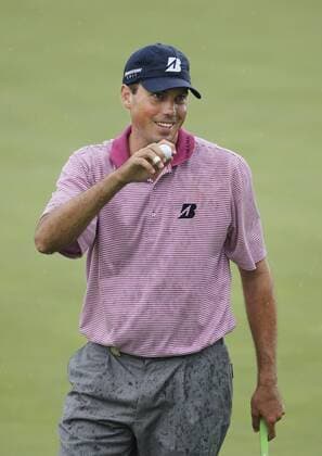 Matt Kuchar (USA) waves to the crowd after making par on the 18th hole during the second round of the 92nd PGA Championship at Whistling Straits in Kohler, Wisconsin on August 13, 2010.  BKX2010081328