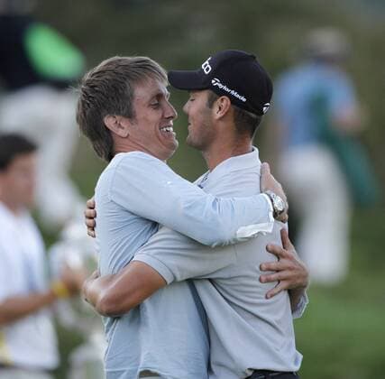 Martin Kaymer (R) of Germany hugs his manager Johan Elliot after winning the 92nd PGA Championship at Whistling Straits in Kohler, Wisconsin on August 15, 2010. Kaymer won a three-hole playoff by one stroke after finishing regulation play with a 11-under-par 277.  BKX2010081514 o0 Jubel Freude