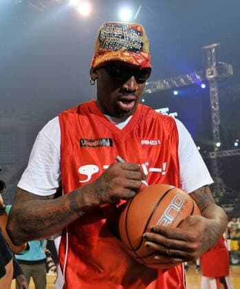 Dennis Rodman signs autograph after the game of street basketball against Japan s Somecity goes to S2E at the Ariake Colosseum in Tokyo, Japan, on August 19, 2010.  TKP2010081929