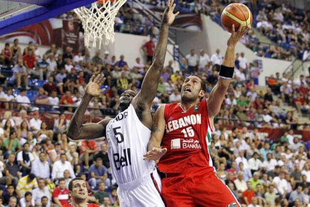 Canada (white) vs Lebanon (red). Day 1 of the 2010 FIBA World Championship in Izmyr. 28 August 2010. Preliminary round - Fadi El Khatib (R) vs Joel Anthony 
