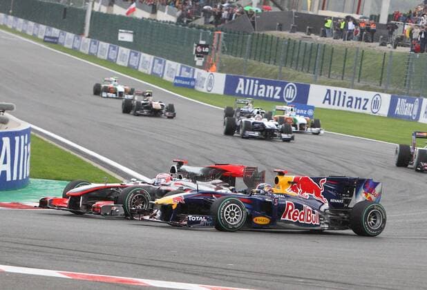 Formel 1, GP von Belgien in Spa, 29.08.10 Jenson Button, McLaren Mercedes, Sebastian Vettel (vorn), Red Bull Racing,