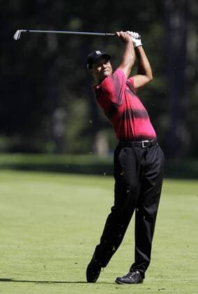 Tiger Woods (USA) hits an iron on the fourth hole fairway in the final round of The Barclays at Ridgewood Country Club in New Jersey on August 29, 2010.  NYP20100829110
