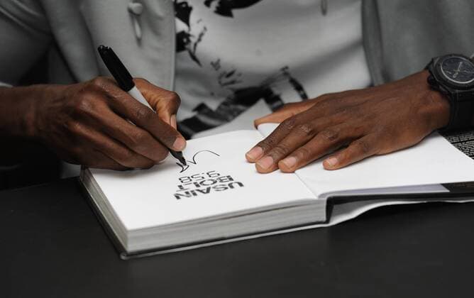 Jamaican sprinter Usain Bolt attends a signing of his autobiography Usain Bolt: 9.58 at Waterstone s, Piccadilly in London on September 2, 2010.  LON20100902109