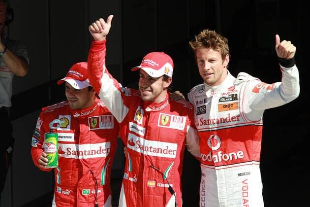 Formel 1, GP von Italien in Monza, 12.09.10 Fernando Alonso Mitte, Scuderia Ferrari, Sieger vor Jenson Button re., McLaren Mercedes, und Felipe Massa, Scuderia Ferrari, o0 Jubel Freude