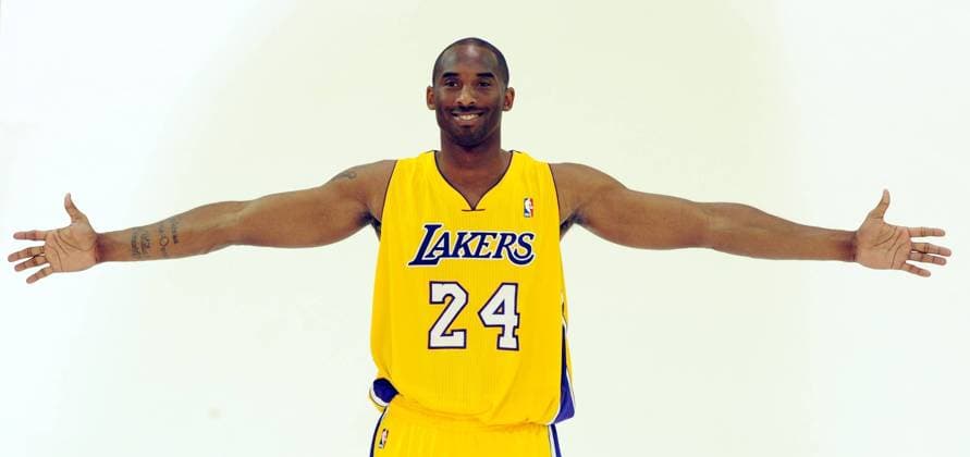 Los Angeles Lakers Kobe Bryant and head poses for photos during the basketball team s media day at Toyota Sports Center in El Segundo, California on Sept. 25, 2010.  LAP2010092549