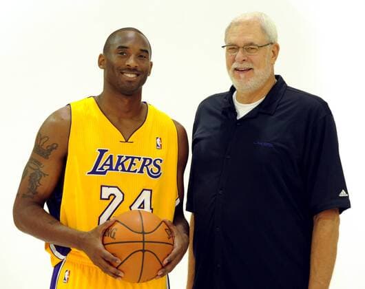 Los Angeles Lakers Kobe Bryant and head coach Phil Jackson, pose for photos during the basketball team s media day at Toyota Sports Center in El Segundo, California on Sept. 25, 2010.  LAP2010092501