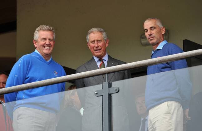 Golf - Ryder Cup 2010 - Practice Day 2 - Charles - The Prince of Wales (C) chats to Europe team captain Colin Montgomerie (SCO, L) and US team captain Corey Pavin (USA) at Celtic Manor, Newport 