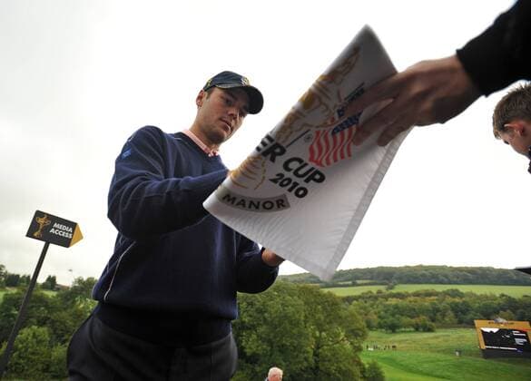 Golf - Ryder Cup 2010 - Practice Day 3, Martin Kaymer (GER) of Europe signs autographs during practice at Celtic Manor, Newport 