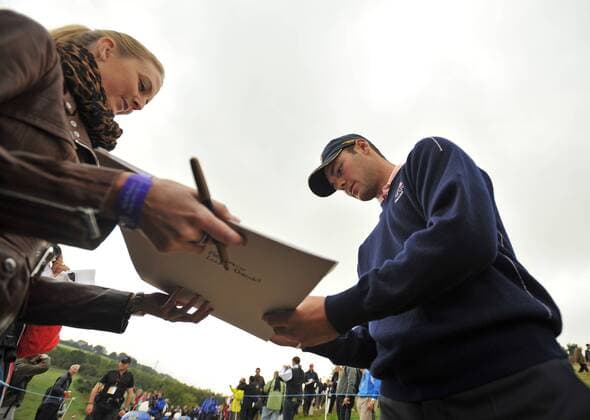 Golf - Ryder Cup 2010 - Practice Day 3, Martin Kaymer (GER) of Europe signs autographs during practice at Celtic Manor, Newport  o0 Fan, Publikum