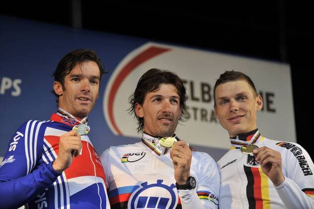 Road World Championships Time Trials, Elite Men held in Geelong Victoria - Fabian Cancellara from Switzerland (Gold) centre, David Millar from Great Britain (Silver) Left and Tony Martin from Germany (Bronze) Right on the Podium after being presented with thier medals. xPeterxBlakemanx  ActionPlus11098964 Content restricted for UK based newspaper
