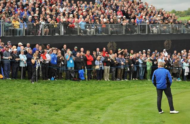 Golf - Ryder Cup 2010 - Practice Day 3 European team captain Colin Montgomerie SCO reacts to a joke from the gallery during practice at Celtic Manor, Newport  o0 Fan Zuschauer
