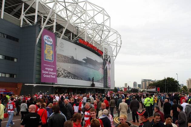 Rugby League - Super League Grand Final - St. Helens vs. Wigan Warriors - Fans gather on Sir Matt Busby Way prior to the game at Old Trafford 