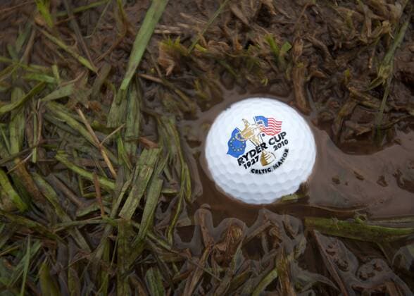 Golf - Ryder Cup 2010 - Day 3, 3rd Session Set-up picture of a Ryder Cup branded golf ball on the course at Celtic Manor, Newport  Objekte Golfball Equipment Detail Matsch Schlamm Dreck o0 Schriftzug Logo Wales