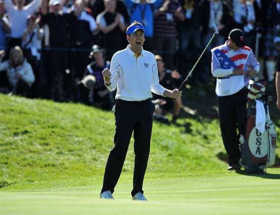 Golf - Ryder Cup 2010 - Day 4, Singles Ian Poulter (England) of Europe celebrates winning his singles match on the 14th green at Celtic Manor, Newport 