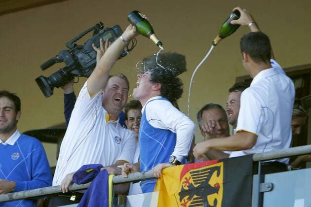 Golf - Ryder Cup 2010 - Day Four European Team mates Peter Hanson (SWE) (L) and Martin Kaymer (GER) (R) and Rory McIlroy (Northern Ireland) (C) get soaked in champagne after winning the Ryder Cup at Celtic Manor, Newport  o0 Mc Dowell Nordirland Ilroy