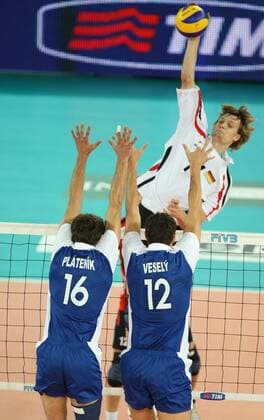 Robert Kromm of Germany spike the ball ober the block by Peter Platenik (16) and Jakub Vesely (12) of Czech Rep. during the match Germany v Czech Republic of the third round of FIVB Men s Volleyball World Championship Italia 2010 at Palalottomatica in Rome, Italy on October 5th, 2010. xMarcoxMegax  ActionPlus20150345