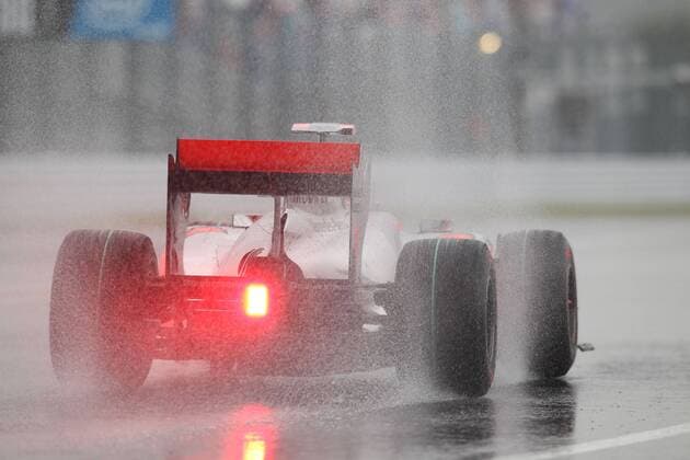 Formel 1, GP von Japan in Suzuka, 09.10.10 Jenson Button, McLaren Mercedes, o0 Regen, Spray