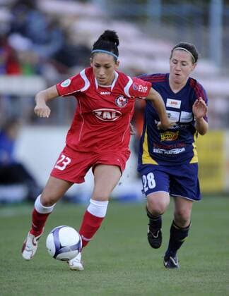 Nadine Keßler (left, Ptsdam) and Rebecca Robison (right, Aland), 1.FFC Turbine Potsdam - Aland United, Fußball, UEFA Women - Champions League, Saison 2010 2011, Potsdam, 13.10.2010,