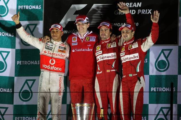 Motorsports Formula 1: World Championship 2010, GP of Korea, L-R: 02 Lewis Hamilton (GBR, Vodafone McLaren Mercedes), race engineer Christian Dyer (AUS, Scuderia Ferrari Marlboro), winner 08 Fernando Alonso (ESP, Scuderia Ferrari Marlboro), 07 Felipe Massa (BRA, Scuderia Ferrari Marlboro), xHOCHxZWEIx o0 Jubel Freude Sieg Siegerehrung Ingenieur Renningenieur