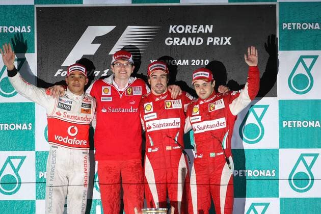 Race, Fernando Alonso (ESP, 2R), Scuderia Ferrari, F10 race winner, Lewis Hamilton (GBR, L), McLaren Mercedes, MP4-25 2nd position and Felipe Massa (BRA, R), Scuderia Ferrari, F10 3rd position and Christian Dyer (Australia), Ferrari Race Engineer Korean Grand Prix -