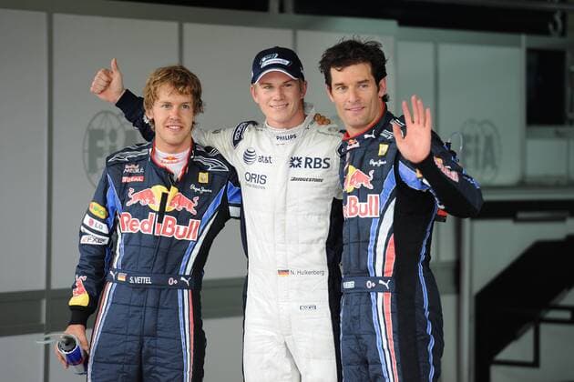 FIRST POLE POSITION FOR GERMAN NICO HÜLKENBERG (center) ON WILLIAMS FW32; HERE BETWEEN RED BULL RENAULT DRIVERS SEBASTIAN VETTEL (left) AND MARK WEBBER RESPECTIVELY SECOND AND THIRD QUICKEST  BernardAsset o0 Jubel Freude Qualifying Aufmacher