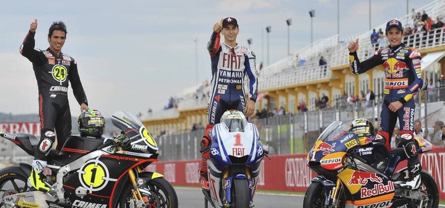 Valencia, 07 11 2010 GP von Valencia - (L-R) Moto2 Weltmeister Tony Elias (ESP Moriwaki) - MotoGP Weltmeister Jorge Lorenzo (ESP Yamaha Racing) - 125er Weltmeister Marc Marquez (ESP redBull derby team) 