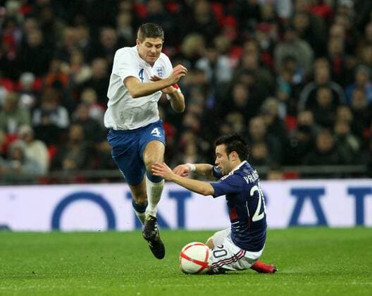 Englands Steven Gerrard goes past Frances Mathieu Valbuena International Friendly England (white) v France (blue) 17th November, 2010 EDITORIAL USE ONLY. No use with unauthorised audio, video, data, fixture lists, club league logos or live services. Online in-match use limited to 120 images, no video emulation. No use in betting, games or single club league player publications.