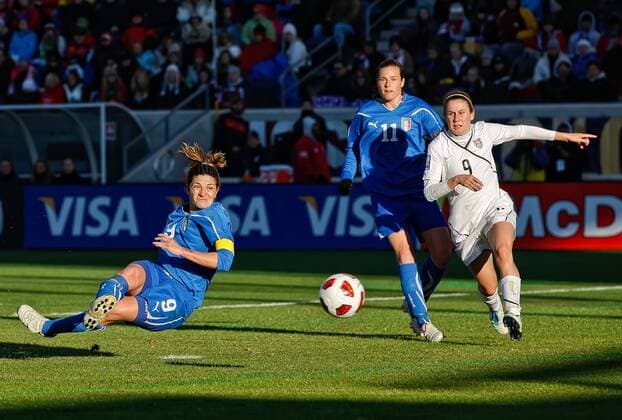 27 November 2010: Italy s captain and forward Patrizia Panico (L) takes a volley in the United States penalty box in game action. The United States defeated Italy by the score of 1-0 at Toyota Park in Bridgeview, IL. Icon164112710026 o0 WM USA EDITORIAL USE ONLY