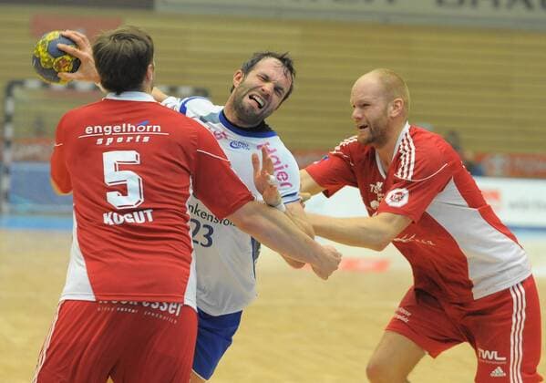 TSG Ludwigshafen Friesenheim vs. TV Grosswallstadt, v.li.: Andrej Kogut (Friesenheim), Oliver Köhrmann (Großwallstadt), Alexander Becker (Friesenheim)