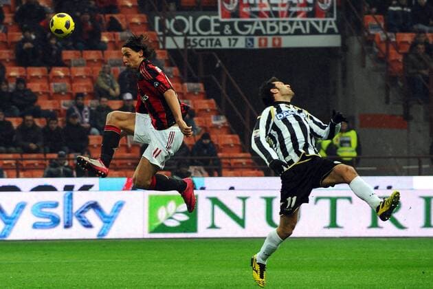 Zlatan IBRAHIMOVIC Milan, Maurizio DOMIZZI Udinese - 09 01 2011 Stadio Giuseppe Meazza San Siro - Serie A 2010 2011 AC Milan (red) Vs Udinese Calcio (white) Andreaxstaccioli