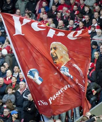 FC Liverpool supporters with a banner of goalkeeper Jose Reina during the Premiership match at Anfield. 