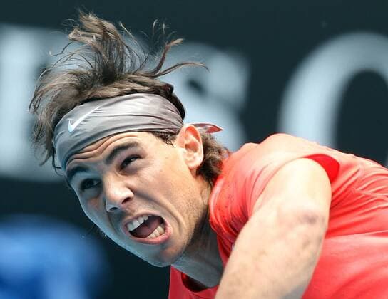 Melbourne - Spain s Rafael Nadal serves during the men s singles first round match at the 2011 Australian Open tennis tournament in Melbourne 