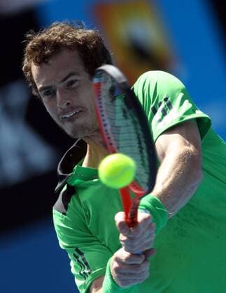 Melbourne - Andy Murray of Great Britain returns the ball during the men s singles first round match at the 2011 Australian Open tennis tournament in Melbourne, 