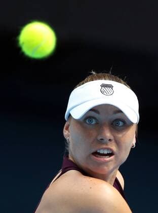 Vera Zvonareva of Russia returns the ball during the third round match of women s singles in Melbourne 