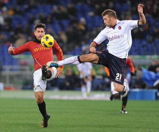 Marco Borriello (Rom) und Michele Canini (Cagliari) - AS Rom (rot) vs Cagliari Calcio - massimoxoliva
