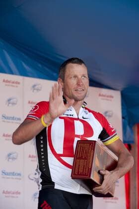 LANCE ARMSTRONG (Radioshack) is present with Australian RM Williams boots by Premier at the end of his last international road race at Stage 6 Tour Down Under, Adelaide. - ZUMAf96