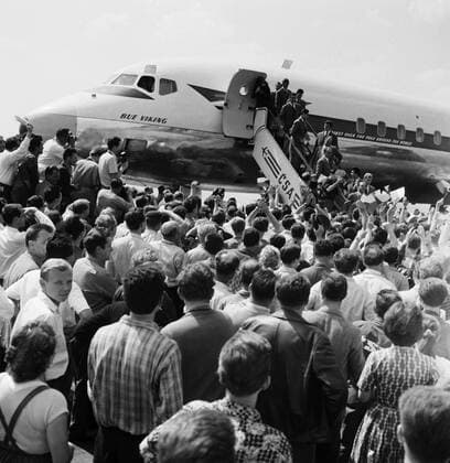 Players of Czechoslovak national soccer team are greeted by fans at Prague s Ruzyne airport upon their arrival from the 1962 soccer World Cup finals in Chile where they won silvermedals, June 22, 1962. CTK Photo Viktor Lomoz  CTKPhoto02015442