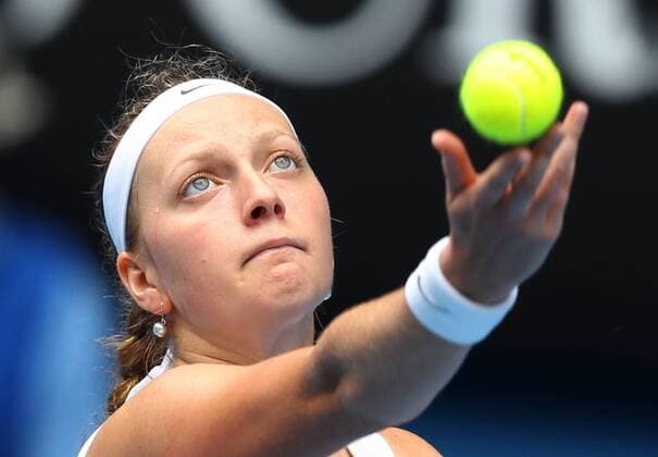 Petra Kvitova of the Czech Republic serves during the women s singles quarter-final match at the Australian Open tennis tournament in Melbourne, Australia, on Jan. 26, 2011. 