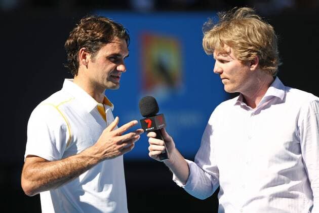 Roger Federer l., SUI, talking to TV host Jim Courier USA after his match in the 2011 Australian Open men s singles fourth round in Melbourne, 23 01 2011 -
