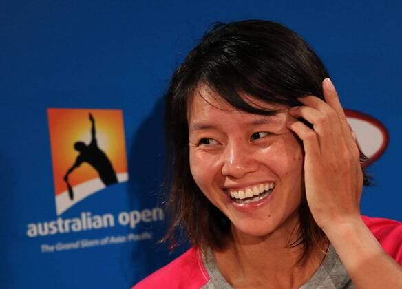 China s Li Na smiles during the press conference after the women s singles semifinal at the Australian Open tennis tournament in Melbourne, Australia, Jan. 27, 2011. --- 