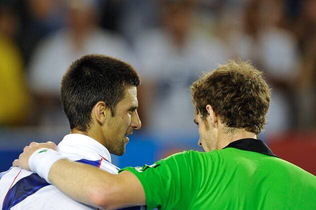 Novak Djokovic (SRB, L) celebrates winning the men s singles final match against Andy Murray (GBR) on day fourteen of the 2011 Australian Open at Melbourne Park, Australia. - ZUMAx35