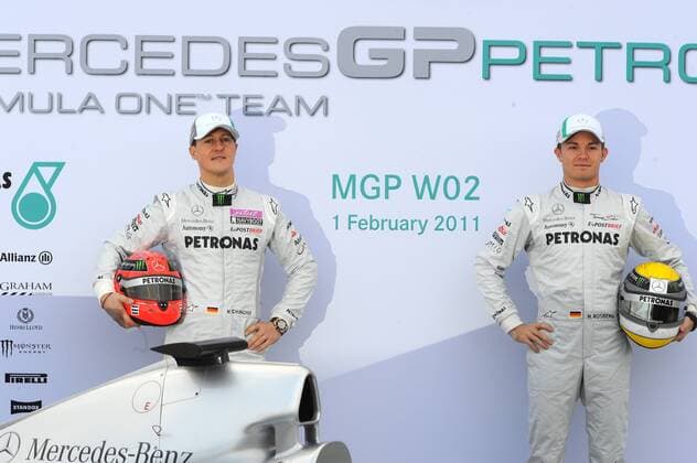 01.02.2011, Valencia - Formel 1 WM 2011 - Präsentation - MICHAEL SCHUMACHER (GER, L) - MERCEDES MGP GP W02 - NICO ROSBERG (GER) - MERCEDES GP MGP W02 --- GillesLevent 