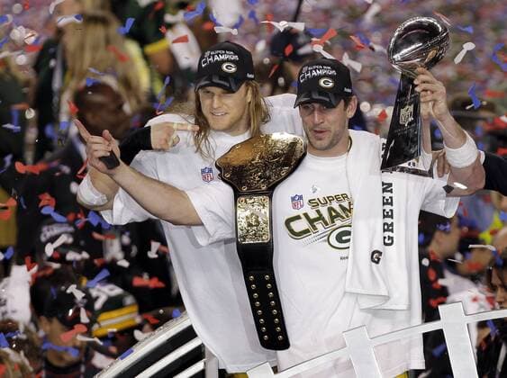 Green Bay Packers linebacker Clay Matthews and Green Bay Packers quarterback Aaron Rodgers celebrate after winning Super Bowl XLV at Cowboys Stadium in Arlington, Texas on February 6, 2011. The Packers beat the Pittsburgh Steelers 31-25.  SBP20110206285 o0 Meisterfeier, Pokal, Trophäe, Gürtel, Objekte, Jubel, Freude,