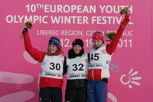 From left: placed second Anais Chevalier of France, first Laura Dahlmeier of Germany and third Uliana Kaysheva or Russia during flower ceremony within EYOWF 2011, in Liberec, Feb. 15, 2011. (CTKxPhoto PavelxKubes)  CTKPhoto6201102210001001
