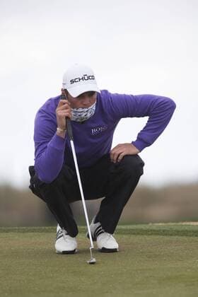 Feb. 27, 2011 - Marana, Arizona, U.S. - MARTIN KAYMER looks over the green with his scarf pulled up over his chin during a cold final match against Luke Donald at the Accenture Match Play Championship. - ZUMAhk1