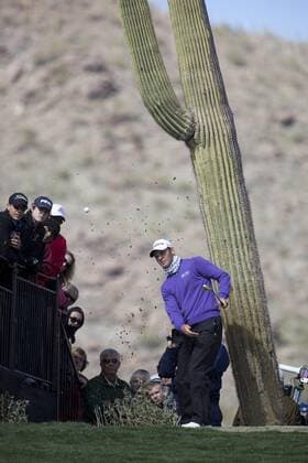 Feb. 27, 2011 - Marana, Arizona, U.S. - MARTIN KAYMER hits the ball from just outside the green with a large saguaro cactus just behind him during the final match against L. Donald at the Accenture Match Play Championship. - ZUMAhk1